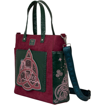 Red and green Charmed Power of Three Convertible Backpack & Tote Crossbody Bag with a decorative patch featuring 'Power of Three' text and symbols on a white background