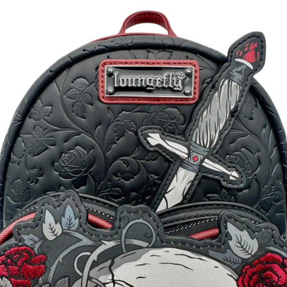 Close-up of Loungefly Dark Romance Mini Backpack with skull, dagger, and roses design featuring a 'Loungefly' brand logo on a white background