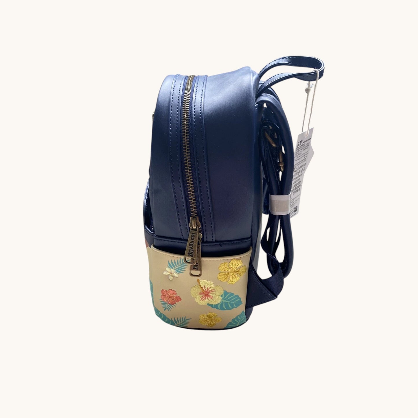 Aulani Resort Exclusive Mickey and Minnie Mouse Firepit Backpack with floral pattern on the side
