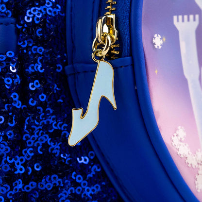 Close-up of Loungefly Disney Cinderella Castle Snow Globe Sequin Mini Backpack with  a silver slipper zipper charm 