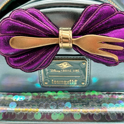 Metallic green and purple Little Mermaid Ariel Sequin backpack with a purple bow and with a large gold fork, featuring the Disney Cruise Line Loungefly logo.