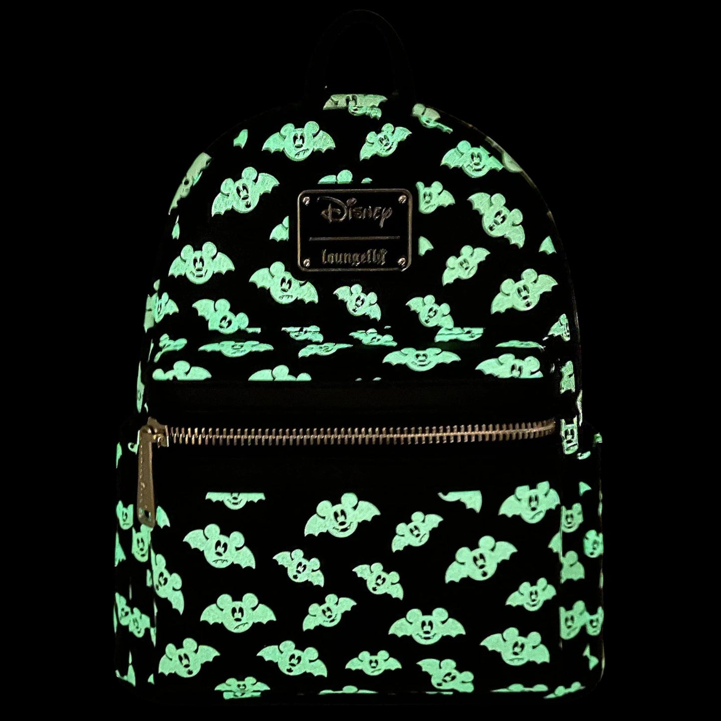 Glowing Totally Batty Mickey Mouse Bat backpack with mickey mouse character pattern on a black background
