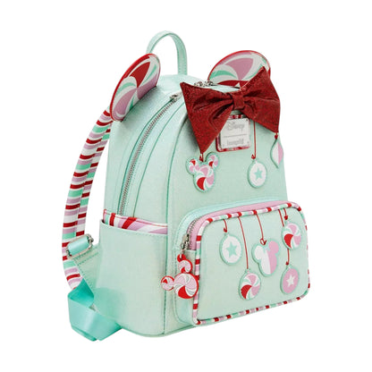 Light blue Minnie Mouse Peppermint Ornament Ears backpack with candy cane design and red bow on a white background