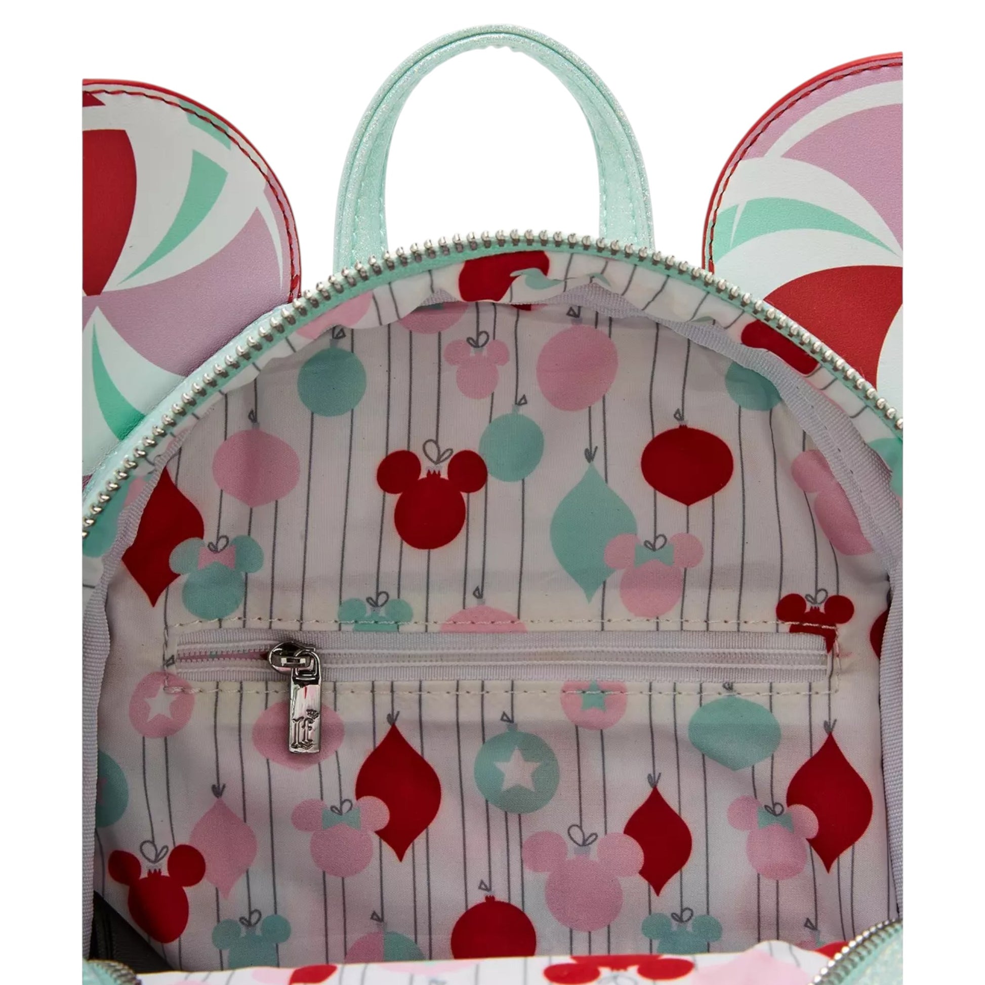 Backpack with colorful patterned minnie mouse head design on a white background