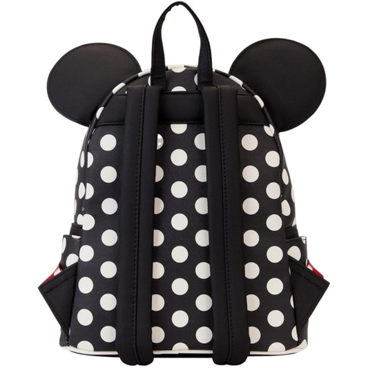 Black and white polka dot backpack with Minnie Mouse ears on a white background