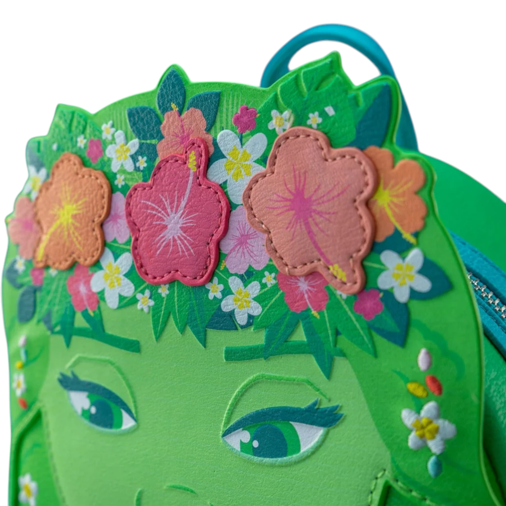 Close up of front of Loungefly Disney Moana Te Fiti Cosplay Mini Backpack with Te Fiti  face and flower crown with floral design details on a white background