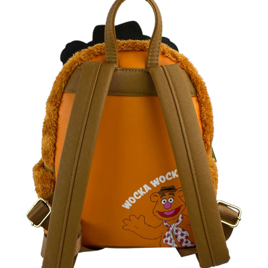 Orange backpack with teddy bear ears and Muppets Fozzie Bear character with Wocka Wocka text on a white background