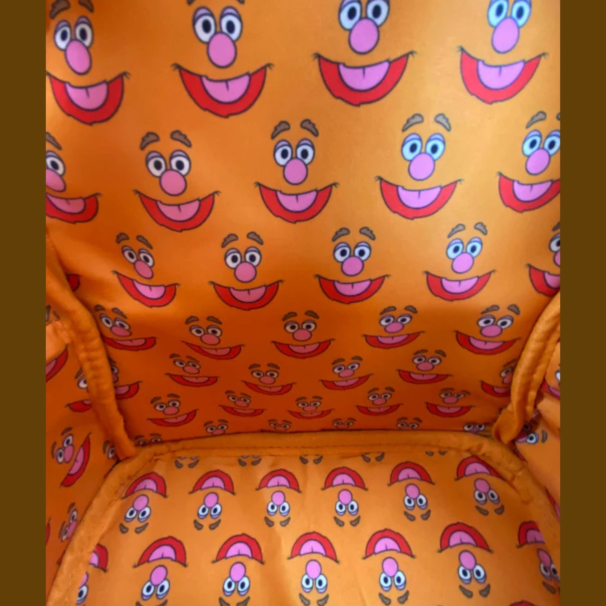 Orange pattern with Muppets Fozzie Bear face pattern