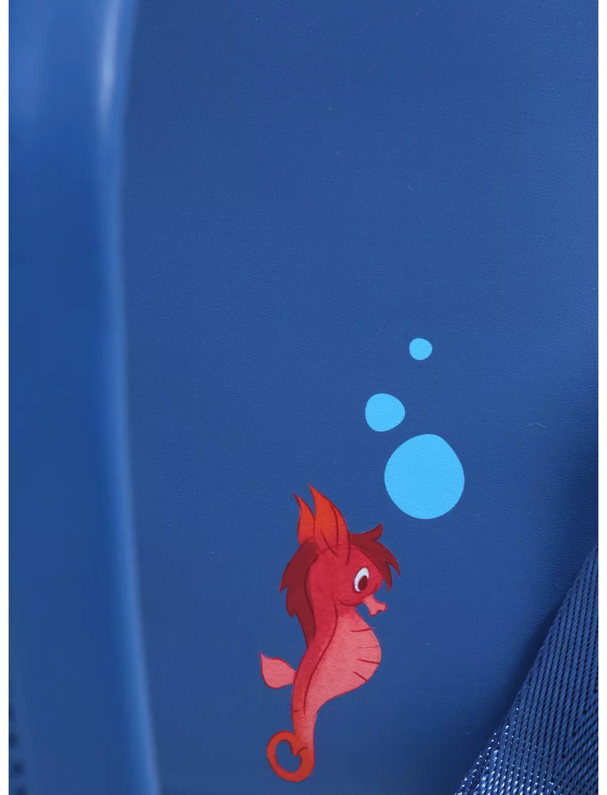 Blue backpack with a red seahorse design and bubbles on a white background