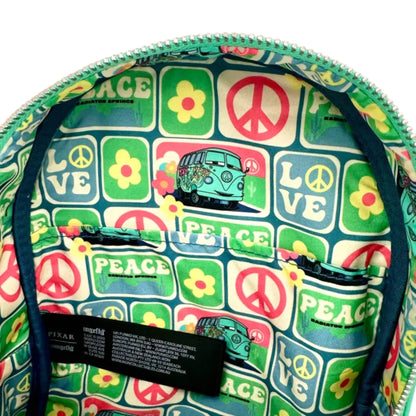 Inside of Teal Loungefly Disney Pixar Cars Fillmore Mini Backpack with peace signs, flowers, and a van design on a colorful background.