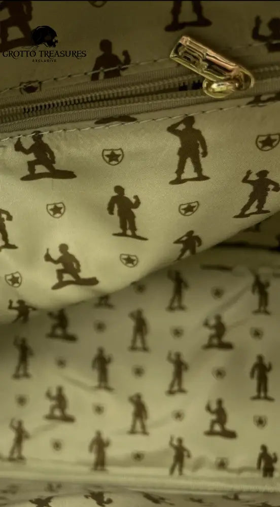 Onside of Camouflage Loungefly Disney Pixar Toy Story Army Men Sequin Mini Backpack with Army Men character [pattern illustrations  on a beige background  and gold zipper