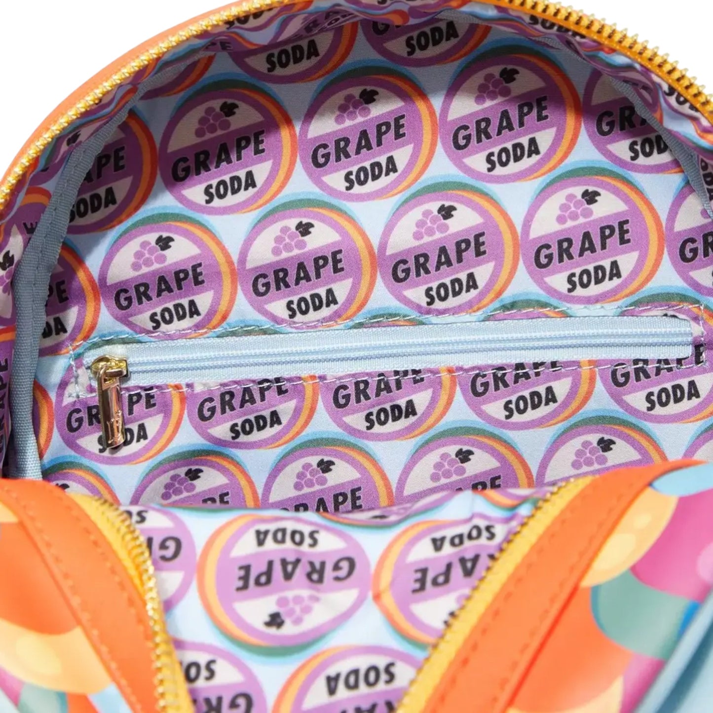 Close-up of a inside of Loungefly Disney Pixar Up Carl & Ellie Balloons Mini Backpack with 'Grape Soda' pattern and orange accents.