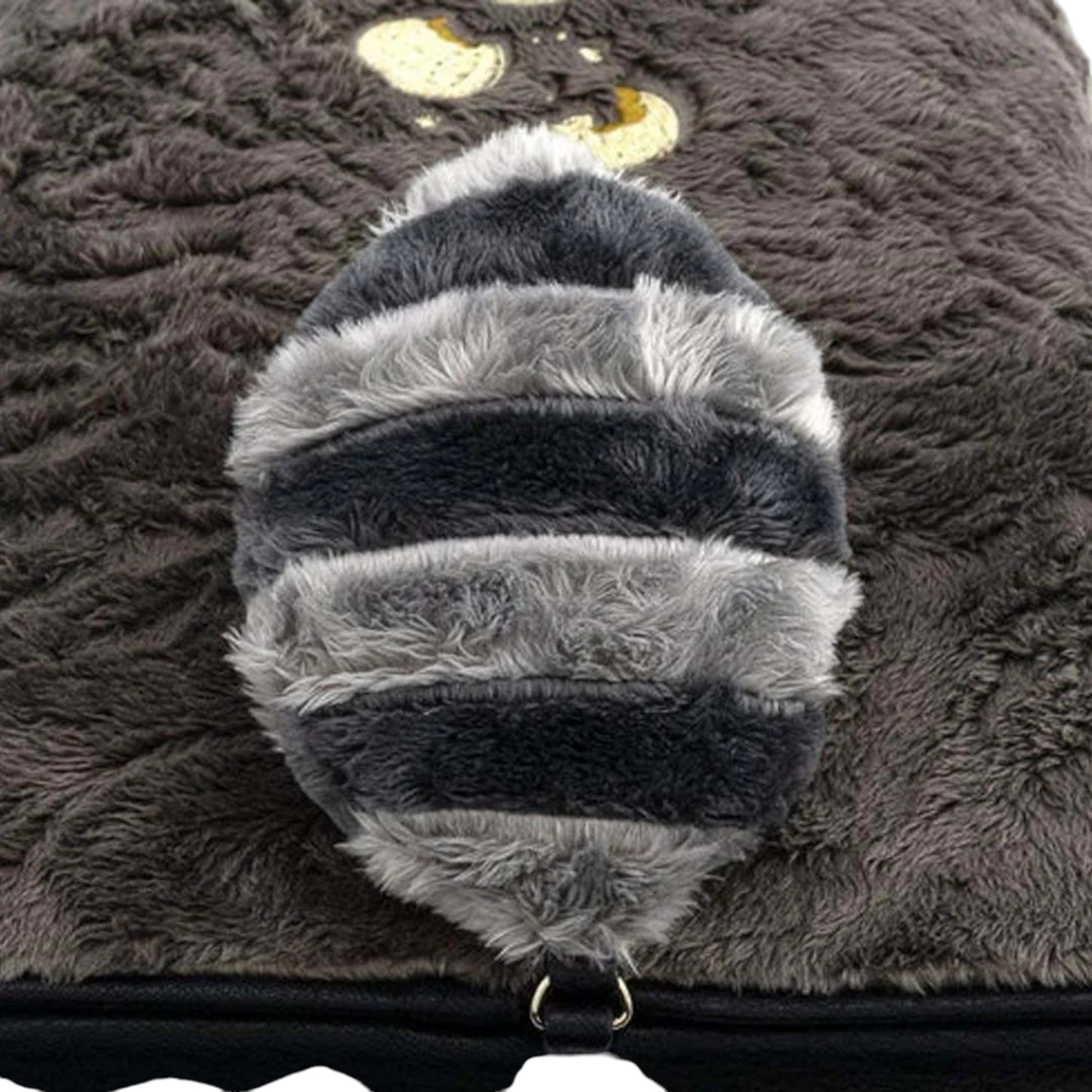 Close-up of Loungefly Disney Pocahontas Meeko Fuzzy Mini Backpack with a plush gray and black striped tail