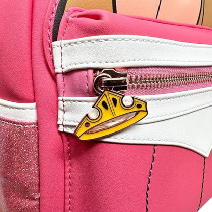Pink Sleeping Beauty Aurora Mini Backpack with a yellow crown-shaped charm on a white zipper