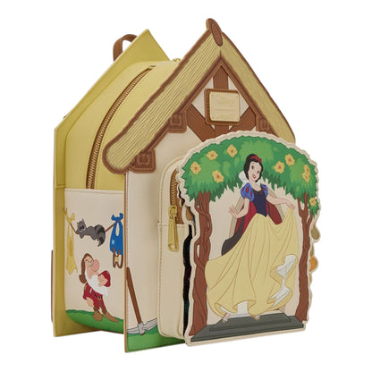 Loungefly Disney Snow White and the Seven Dwarfs Figural Cottage Mini Backpack with Snow White  Character standing on the porch of their cottage on a white background