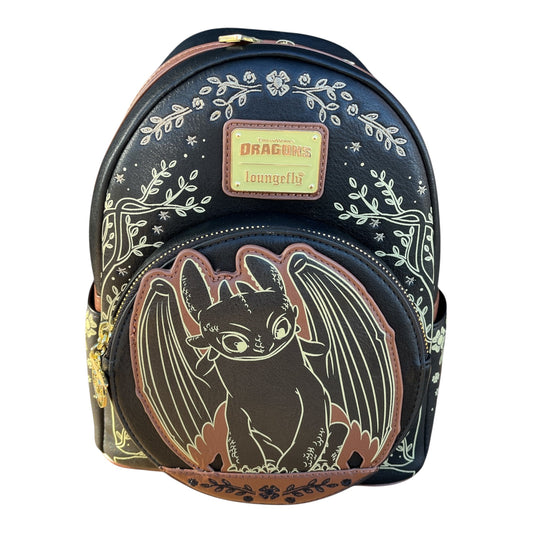 Backpack with Toothless dragon design and Loungefly label on a white background