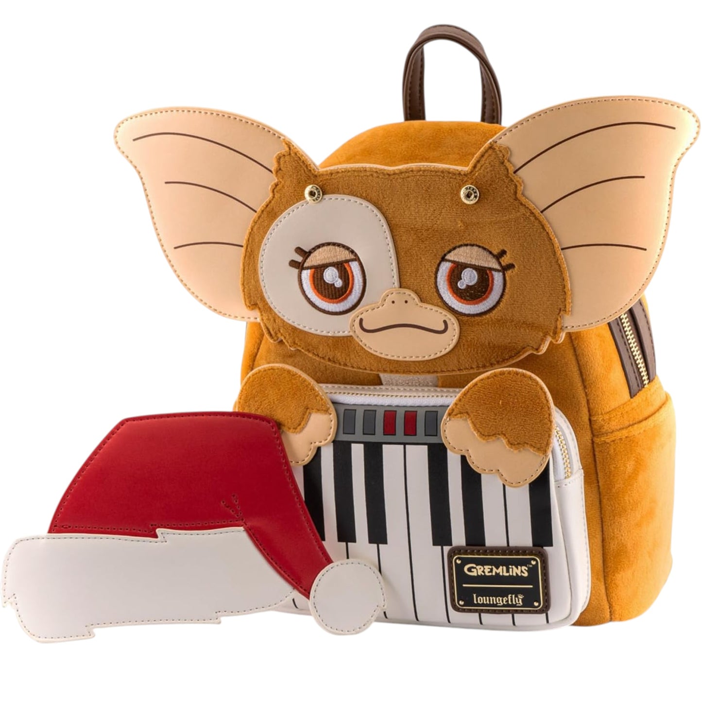 Backpack designed like Gremlins Gizmo Holiday from the Gremlins movie with large ears holding a keyboard.