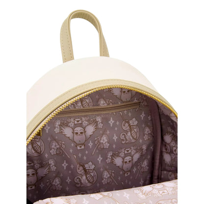 Inside of Loungefly Harry Potter Hedwig Ornamental Mini Backpack with Hedwig character with his wings outstretched with a floral pattern on a white background