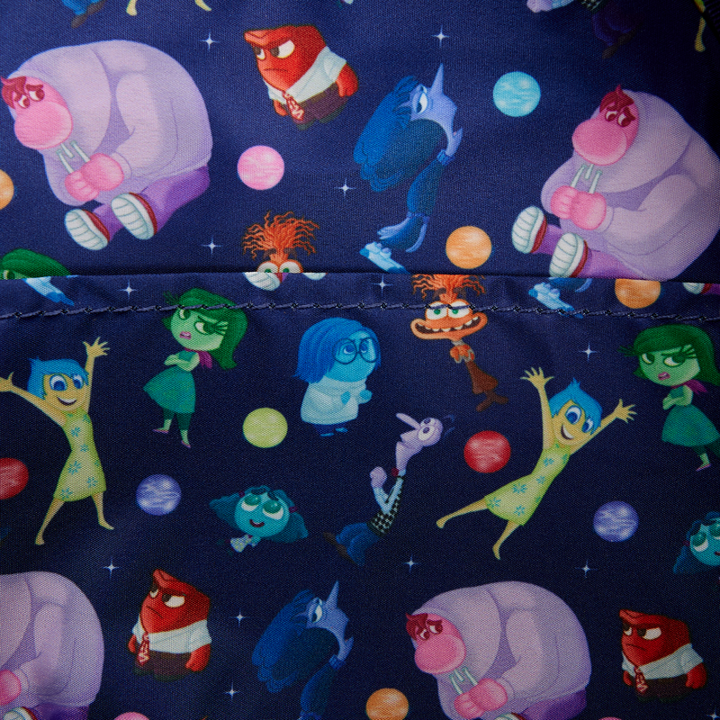 Close-up of interior  of Loungefly Inside Out 2 Light Up Mini Backpack with patterned fabric with movie characters on a dark blue background