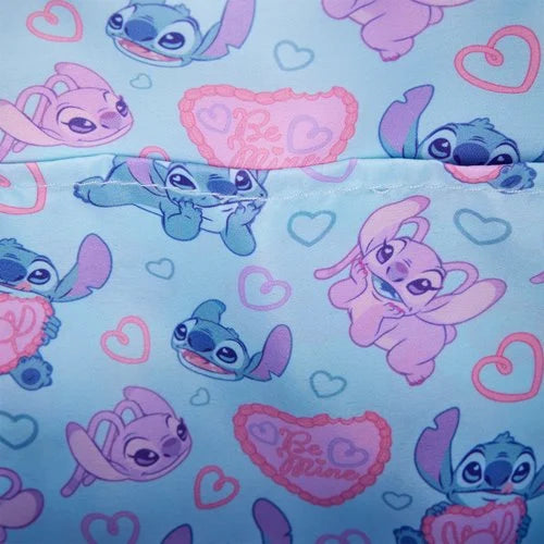Stitch and angel characters with hearts on a light blue background