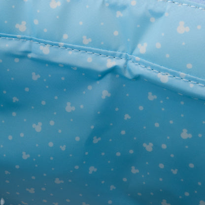 Close-up of blue fabric with white mickey head pattern