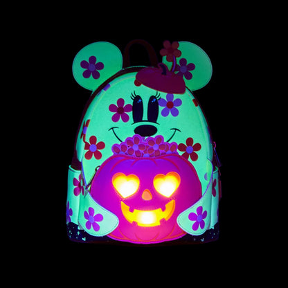 Mouse Floral Ghost Backpack with pumpkin design and flower details glowing on a black background