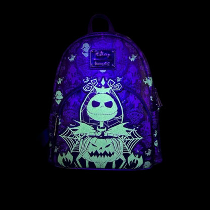 Glowing Backpack with Nightmare Before Christmas-themed design featuring a jack Skellington and jack-o'-lantern on a black background