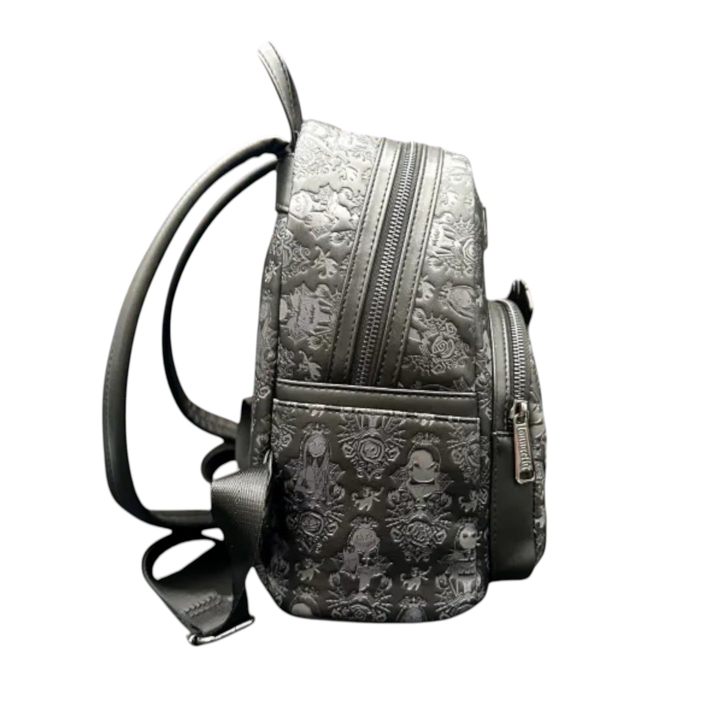 Backpack with Nightmare Before Christmas-themed design featuring a jack Skellington and jack-o'-lantern on a white background