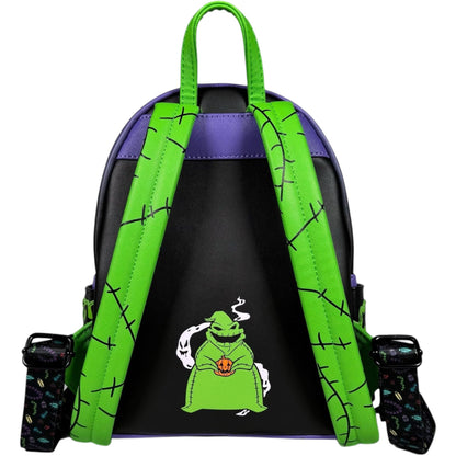 Backpack with green straps and a Oogie Boogie character on a black background