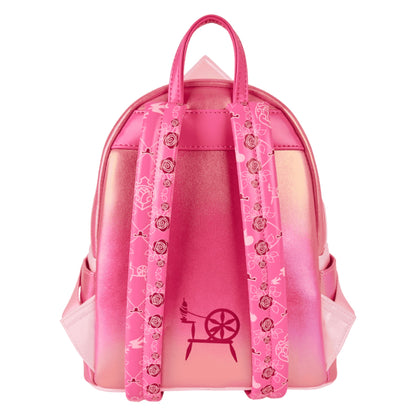 Pink backpack with decorative spindle elements on a white background