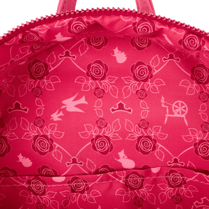 Close-up of a pink bag with white floral and castle pattern