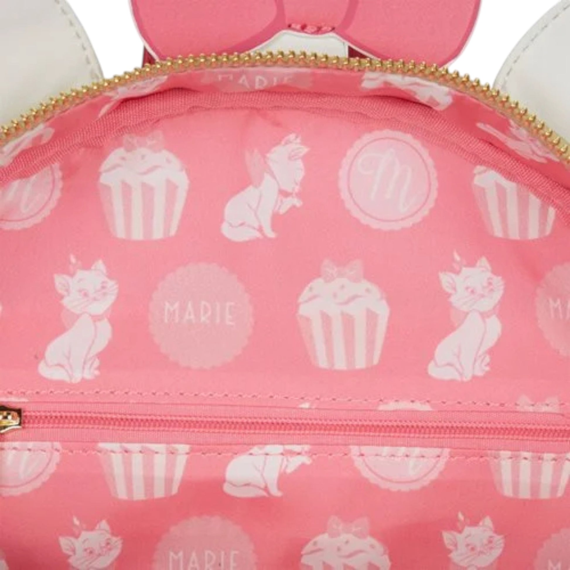 Pink pouch with white patterns of Marie and cupcakes, featuring the name 'Marie'.