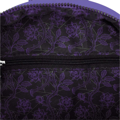 Close-up of inside of Loungefly Disney Villains Exclusive Stained Glass Glow Mini Backpack with purple floral patterned with a zipper.