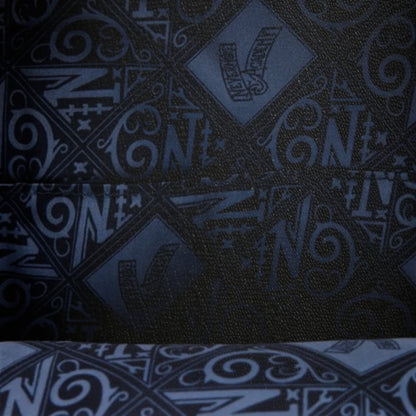 Dark fabric with blue geometric pattern and 'N' text
