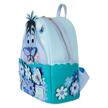 Backpack with Floral Eeyore design and floral patterns on a white background