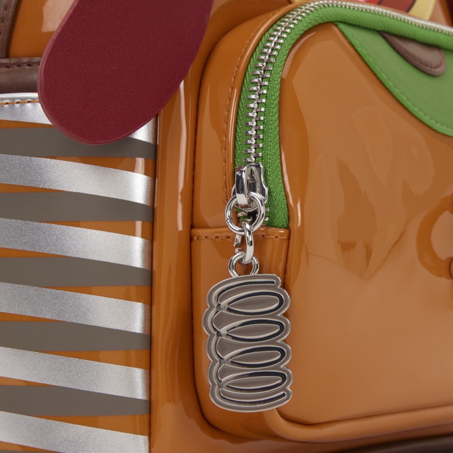 Close-up of silver metal coil zipper charm