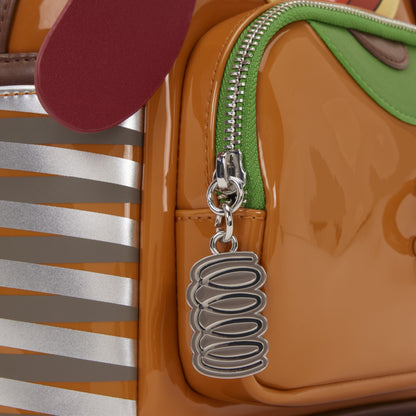 Close-up of silver metal coil zipper charm