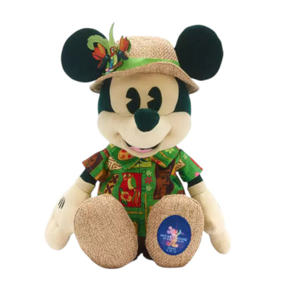 Mickey Mouse 5/12: The Main Attraction Enchanted Tiki Room Plush wearing a hat and Hawaiian shirt on a white background
