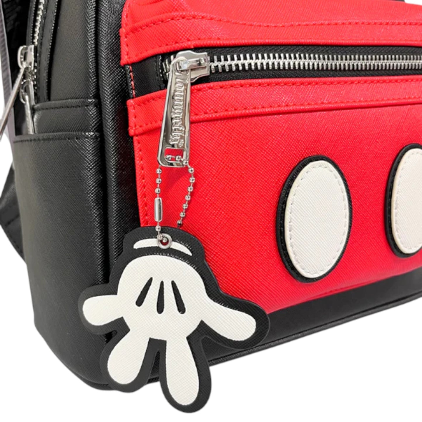 Red and black bag with a Mickey Mouse hand zipper charm attached