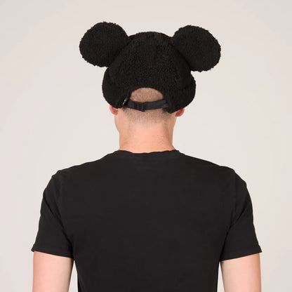 Person wearing a Mickey Sherpa Beanie Classic Black with Mickey ears on a plain background