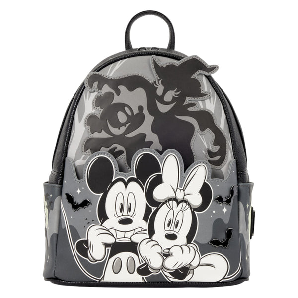 A Disney Minnie Mouse and Mickey Mouse backpack with a gray and black camouflage pattern, featuring black-and-white cartoon characters and spooky silhouettes on a white background.