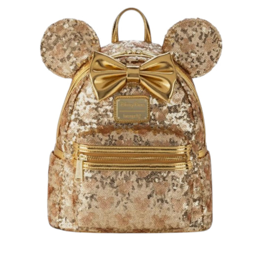 Minnie Mouse Gold Sequin backpack with mouse ears and a bow on a white background