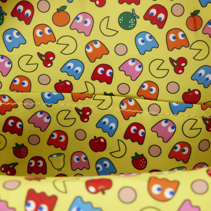 Close-up of inside of Loungefly Pac-Man Glow Mini Backpack with pac-man and video game pattern characters 