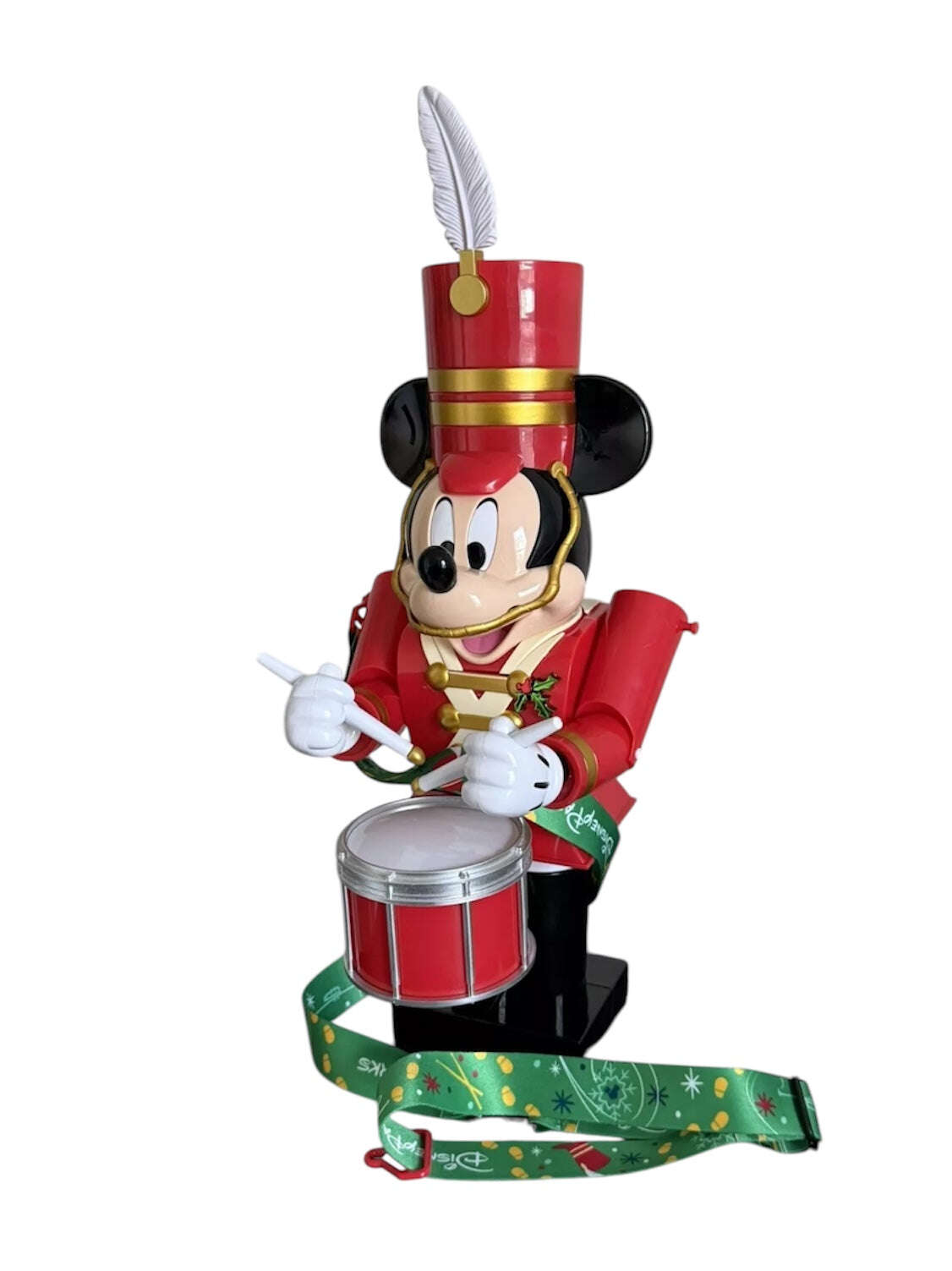 Mickey Mouse toy soldier sipper 
holding a drum on a white background