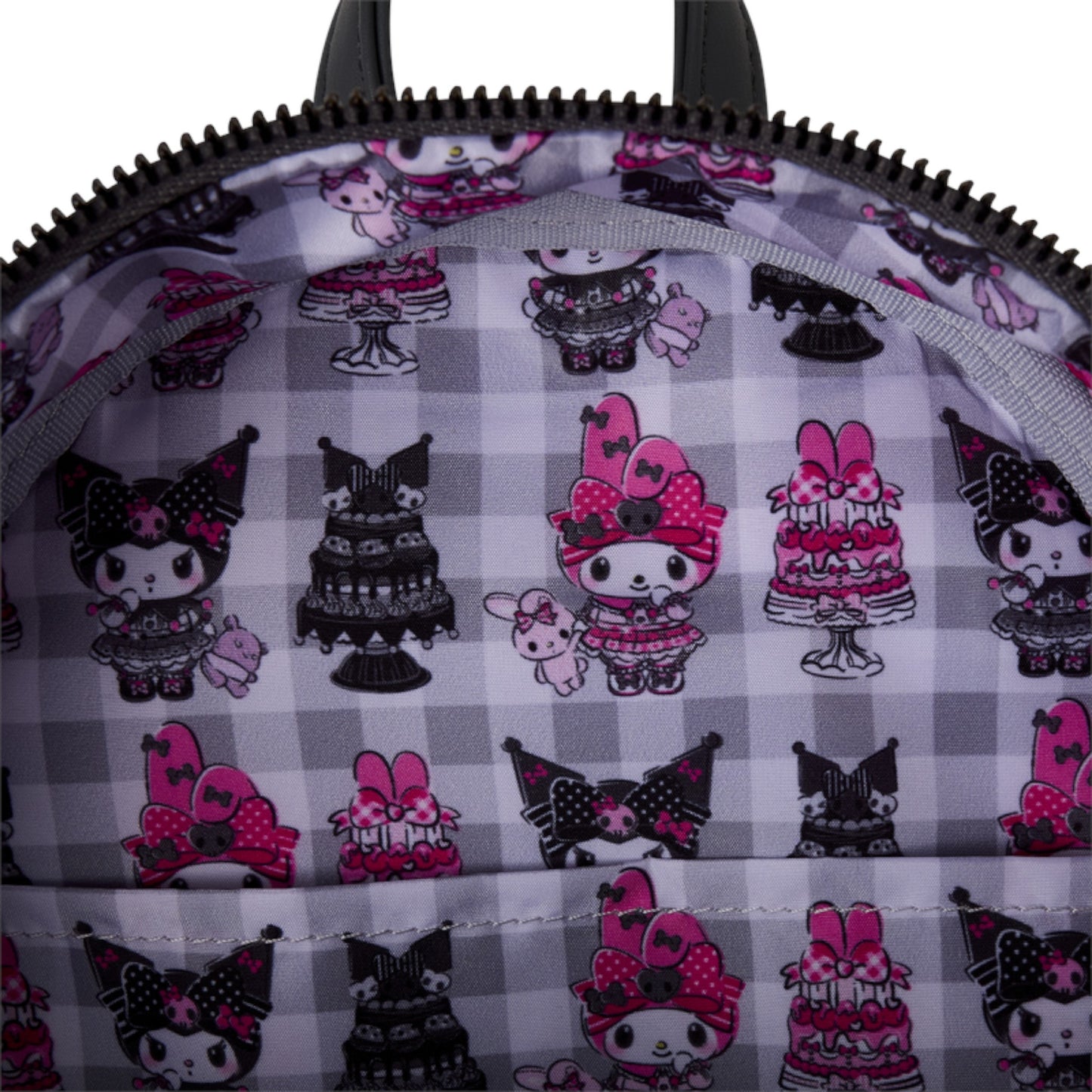 Close-up of a checkered bag interior with My Melody & Kuromi Cake character pattern