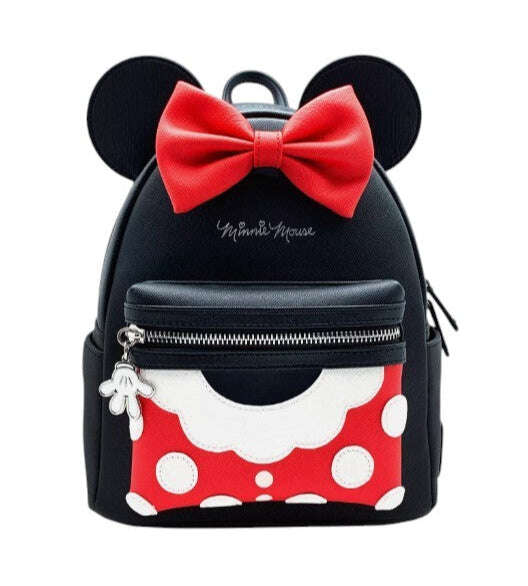 Black backpack with Minnie Mouse ears and bow on a white background