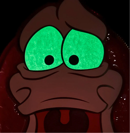 Sebastian's eyes glowing in the dark on a dark background