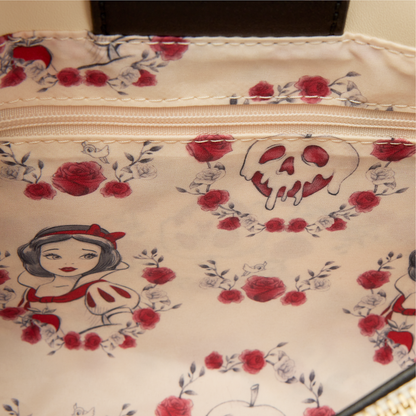 Inside of Loungefly Snow White Exclusive Roses Tote Crossbody Bag with Snow White character design, skull apple, and red rose floral patterns on a white background