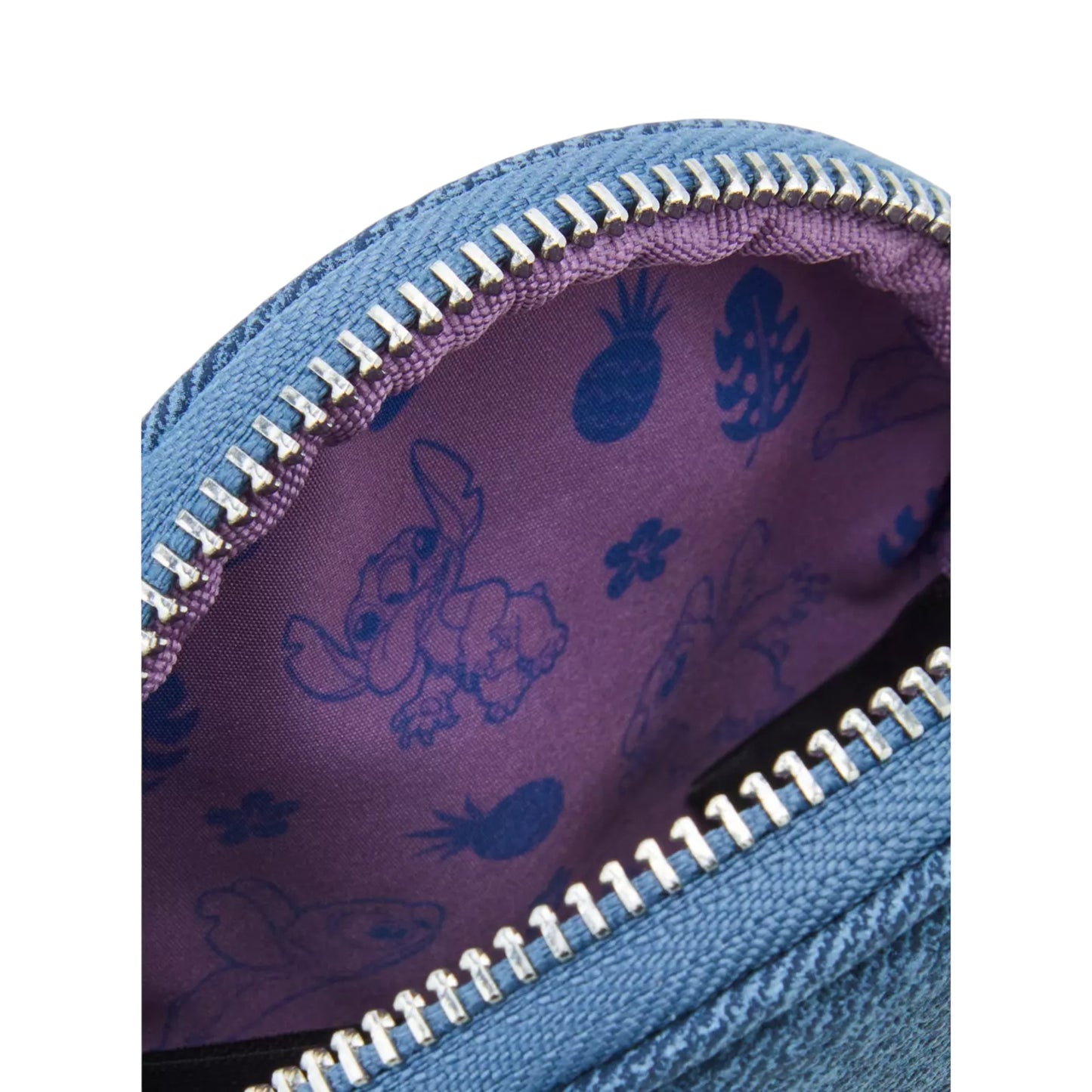 Close-up of a blue denim pouch with a purple lining featuring Stitch character and patterns.