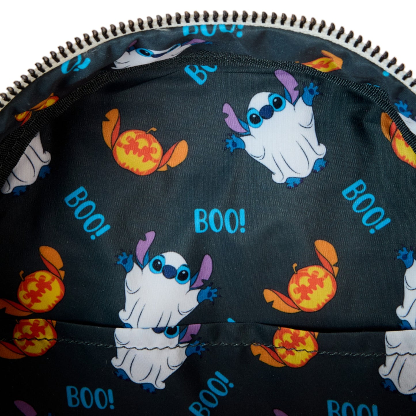 Halloween-themed lining with Stitch Ghost, pumpkins, and 'BOO!' text on a dark background.